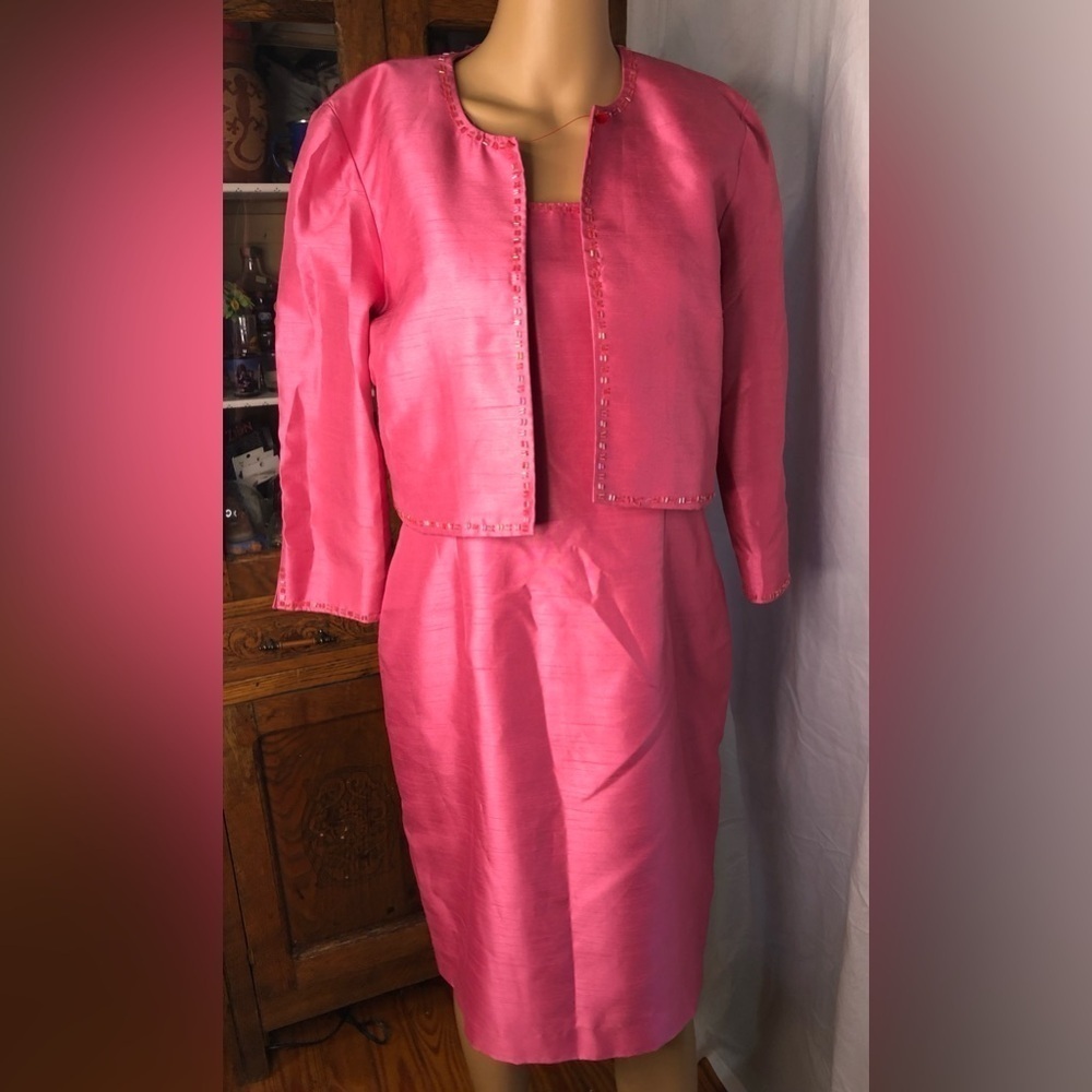 Positive attitude, 8 pink dress with short jacket.
